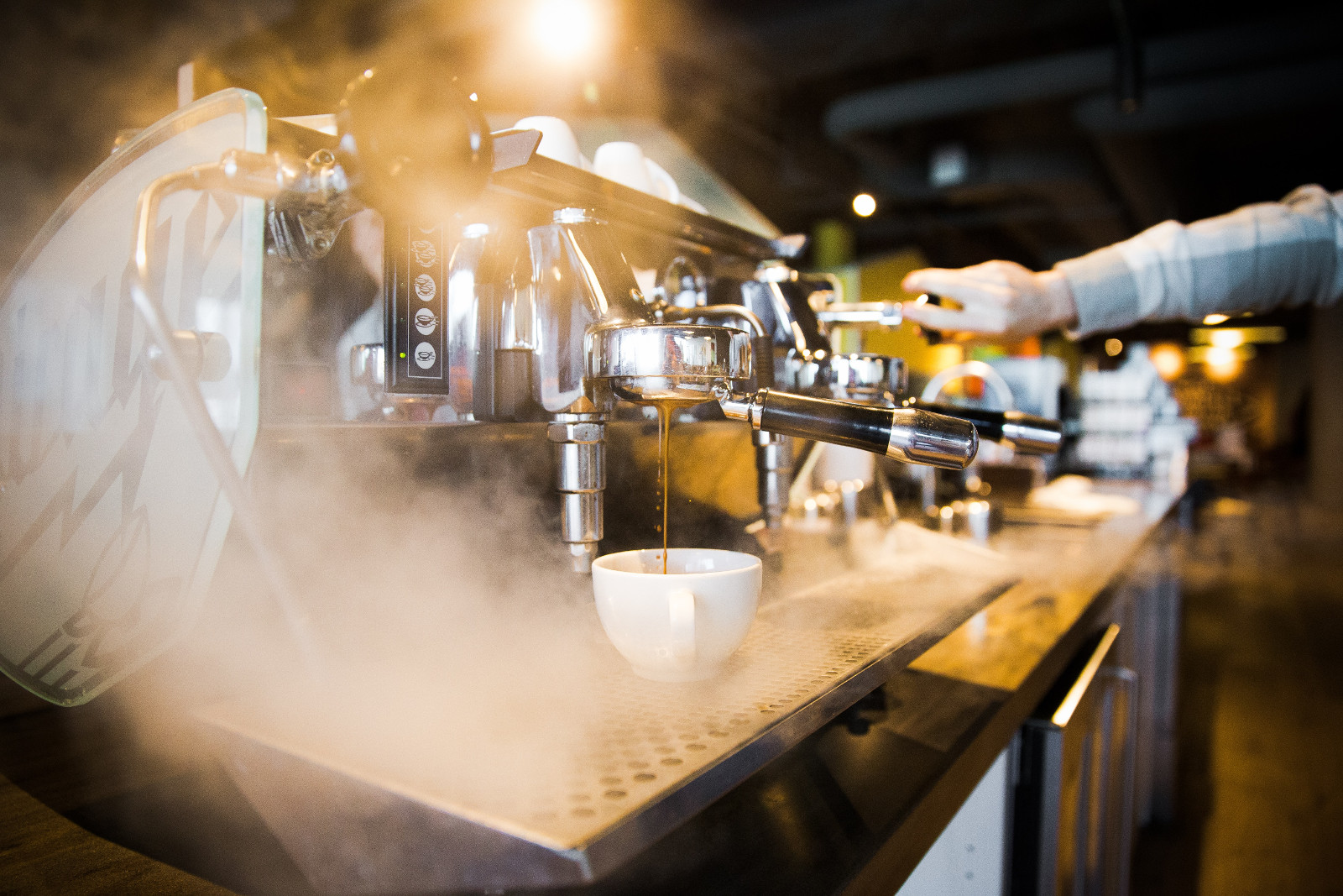 Warm light falling across a coffee machine